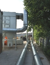 Part of the almost endless ducting for the pneumatic extraction system as it exits the building